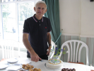 Cutting the cake on Richard's 90th birthday at Friday morning social tennis